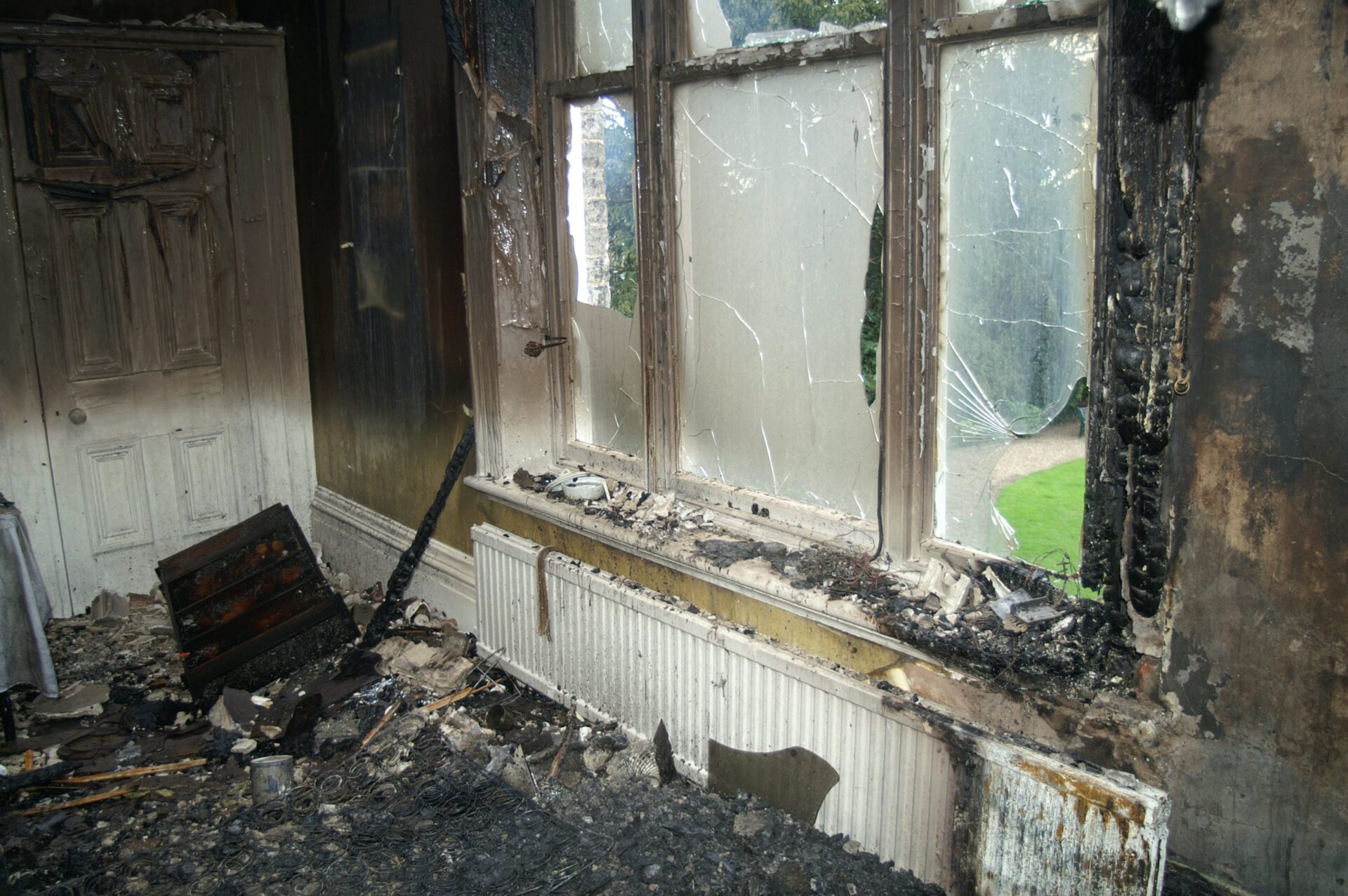 fire damaged living room – Regency Disaster Response Team